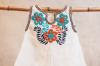 Vestido blanco para bebé.